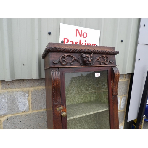 31 - Carved oak two door cabinet 48x27x155