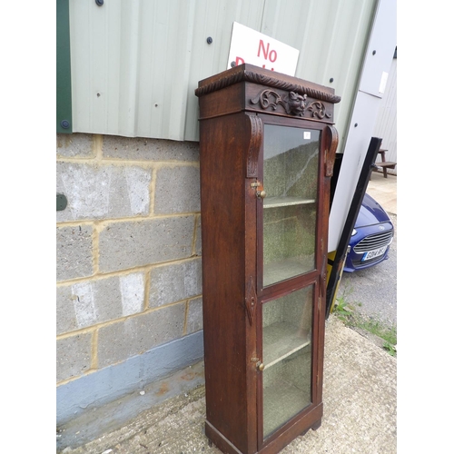 31 - Carved oak two door cabinet 48x27x155