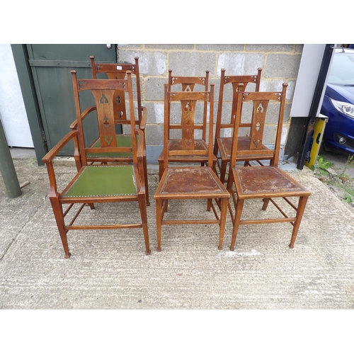 34 - A set of six oak arts and crafts dining chairs (inc 2 carvers)