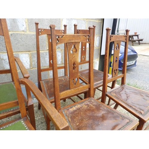 34 - A set of six oak arts and crafts dining chairs (inc 2 carvers)