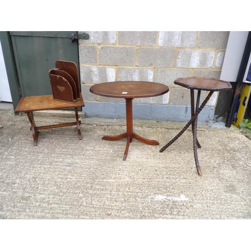 38 - Three oak occasional tables and a stationary rack