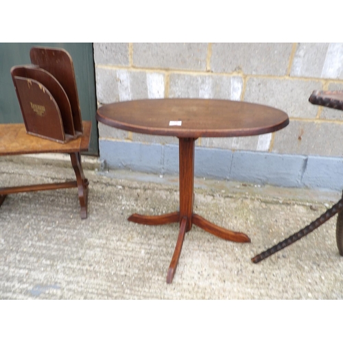 38 - Three oak occasional tables and a stationary rack