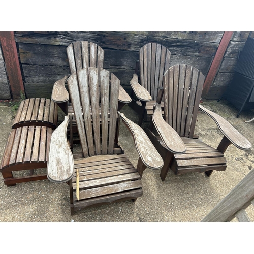 428 - A set of four wooden sun lounger chairs with two stools