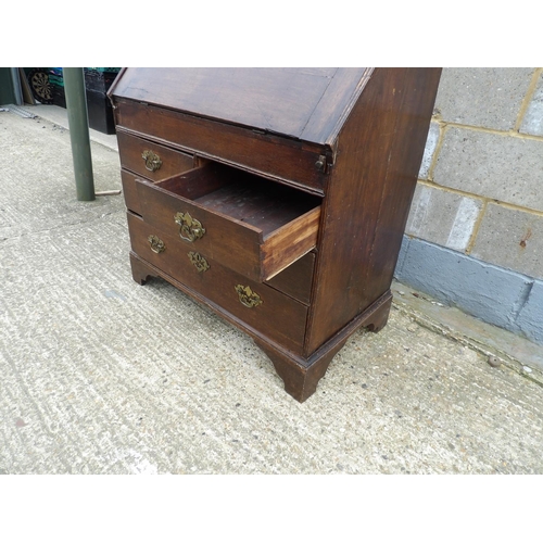 48 - A Georgian oak bureau, fitted to the interior with 2 secret compartments 90cm wide