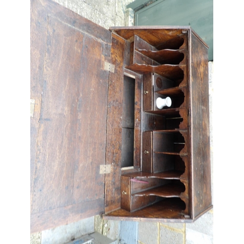 48 - A Georgian oak bureau, fitted to the interior with 2 secret compartments 90cm wide