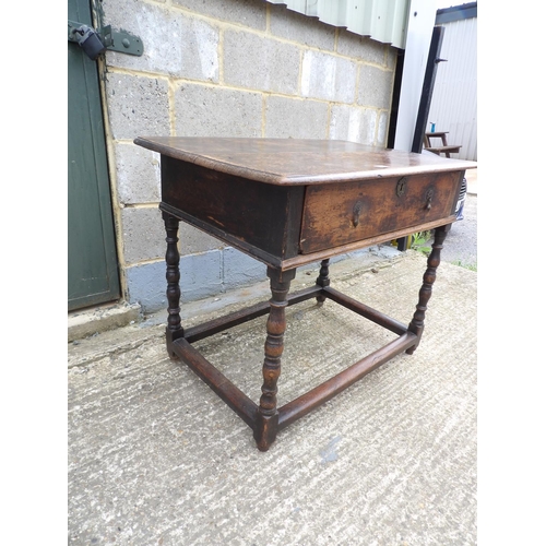 62 - A antique oak single drawer table with brass drop handles 91x58x72