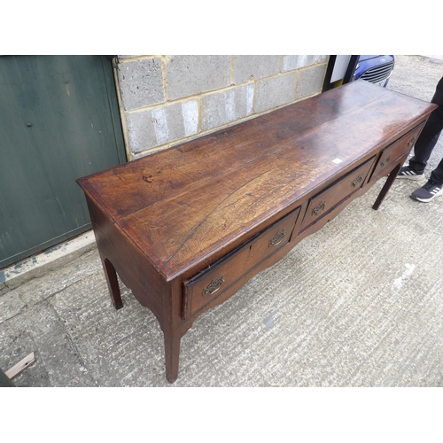 64 - A 18th century oak three drawer dresser base 182x50x77