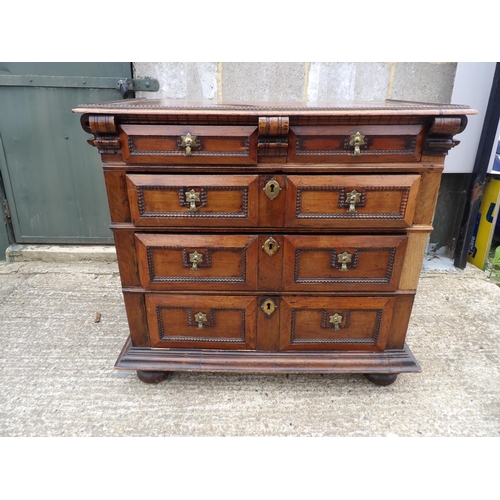 65 - A early European mahogany chest of five drawers  104x60x95