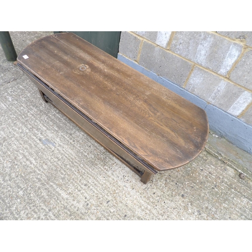 70 - A oak drop leaf coffee table 137x50x42