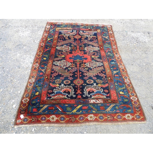 73 - A red and blue pattern oriental rug 200x140