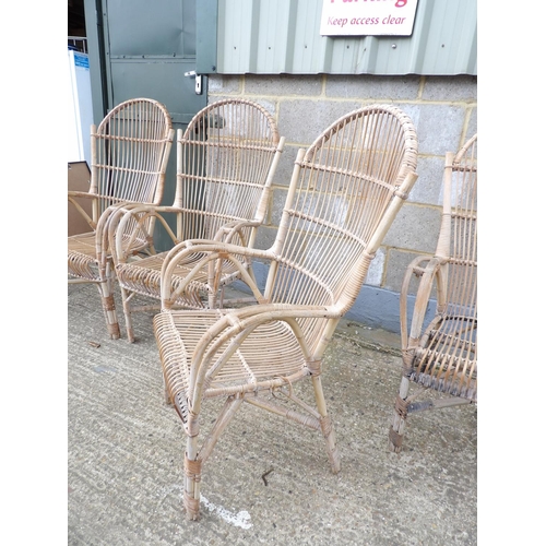 80 - A set of four vintage wicker chairs