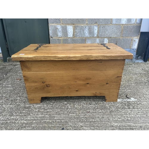 89 - A modern light oak blank box chest 100x50x55