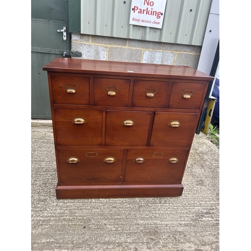 93 - A modern hardwood nine drawer chest by JOHN LEWIS 110x45 x110