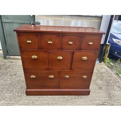 93 - A modern hardwood nine drawer chest by JOHN LEWIS 110x45 x110