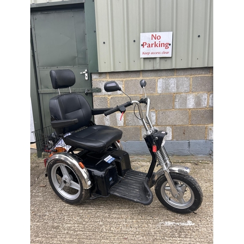 96 - A TGA THRE WHEEL MOBILITY SCOOTER WITH KEY AND CHARGER IN GOOD WORKING ORDER