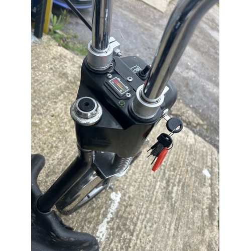 96 - A TGA THRE WHEEL MOBILITY SCOOTER WITH KEY AND CHARGER IN GOOD WORKING ORDER