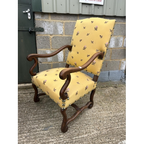 98 - A mahogany framed yellow upholstered throne chair