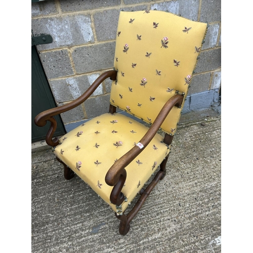 98 - A mahogany framed yellow upholstered throne chair