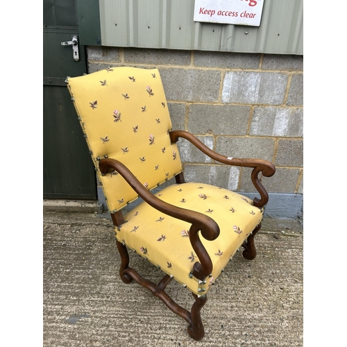 98 - A mahogany framed yellow upholstered throne chair