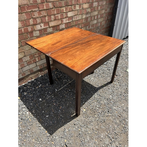 100Z - A Georgian mahogany fold over tea table