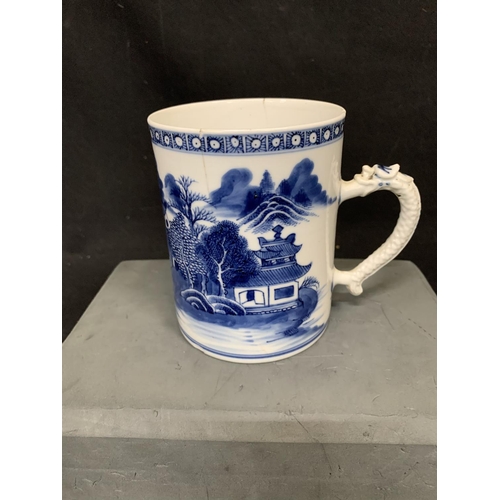 1013 - Chinese Blue and white Pattern Tankard with dragon handle, height 11 cms