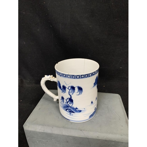 1013 - Chinese Blue and white Pattern Tankard with dragon handle, height 11 cms