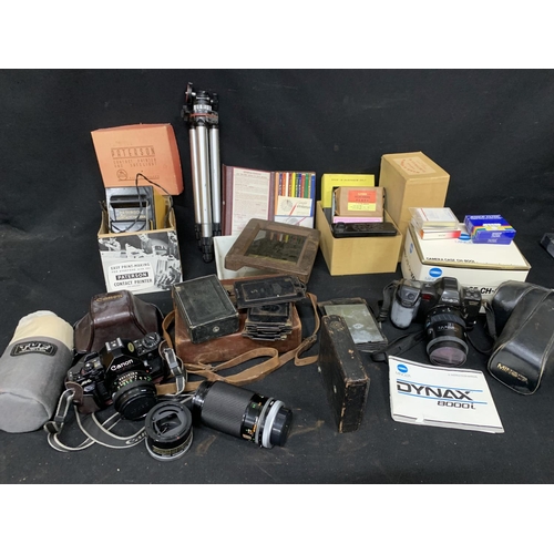 629 - Canon A1 camera, Minolta Camera and other vintage cameras and accessories