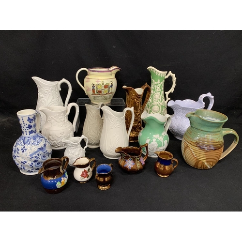 632 - 17 decorative jugs