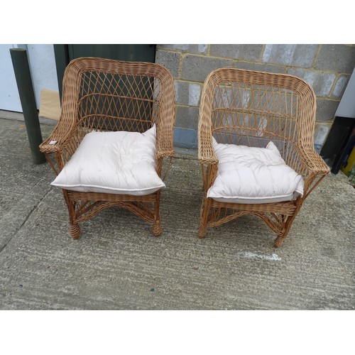 57 - A pair of wicker armchairs