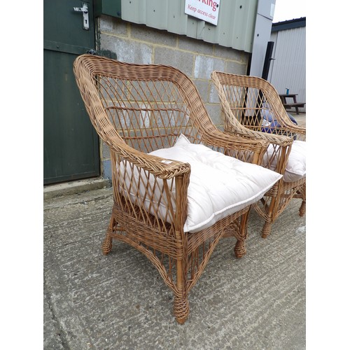 57 - A pair of wicker armchairs