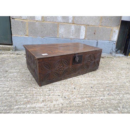 56 - A carved oak bible box 68x38x24