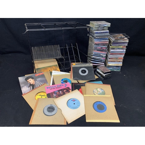 Retro record rack, 18 assorted single records, mixed LP's including 2 ...