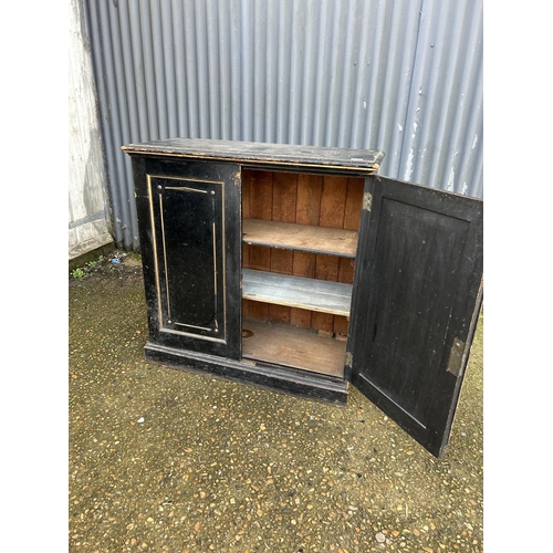 100 - An ebonised line two door cupboard 98x40x100