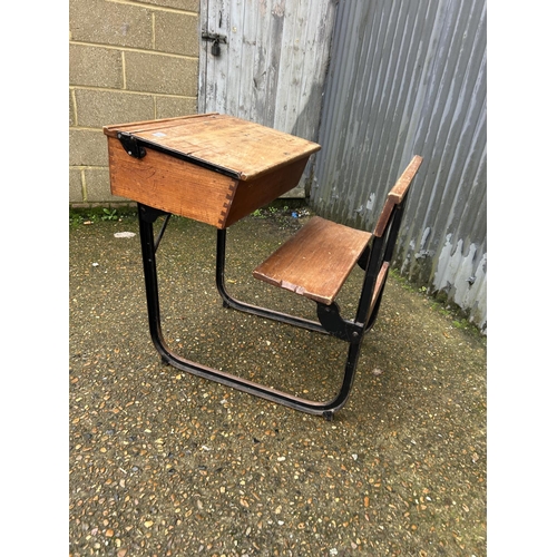 110 - A vintage school desk with lift up top