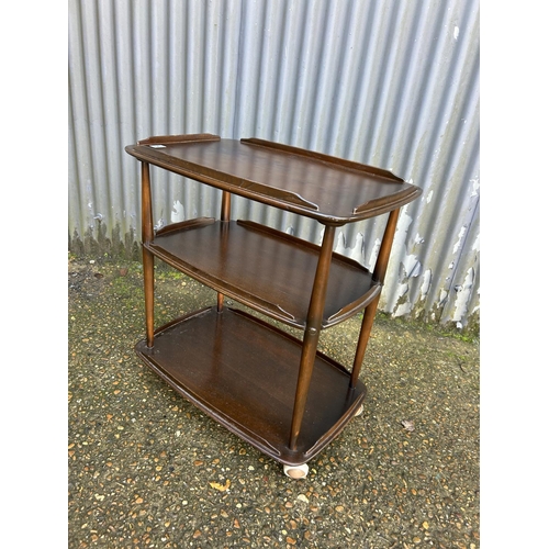 123 - An ercol dark elm tea trolley