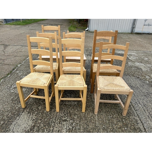 133 - A collection of nine ladder back farmhouse dining chairs assorted styles