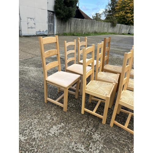 133 - A collection of nine ladder back farmhouse dining chairs assorted styles