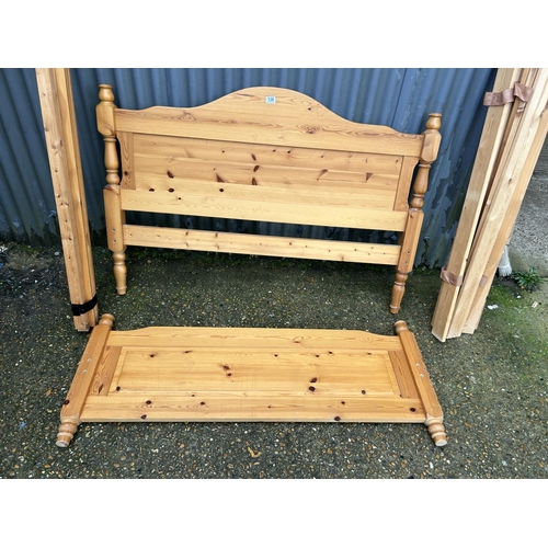 134 - A pine 4'6 double bed frame with all bolts and fittings