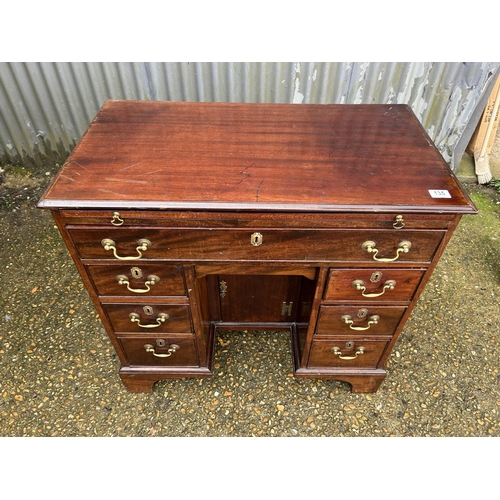 135 - A Georgian mahogany kneehole desk with brushing slide and secret drawer 88x47x72