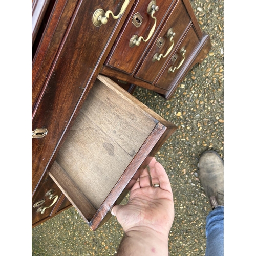 135 - A Georgian mahogany kneehole desk with brushing slide and secret drawer 88x47x72