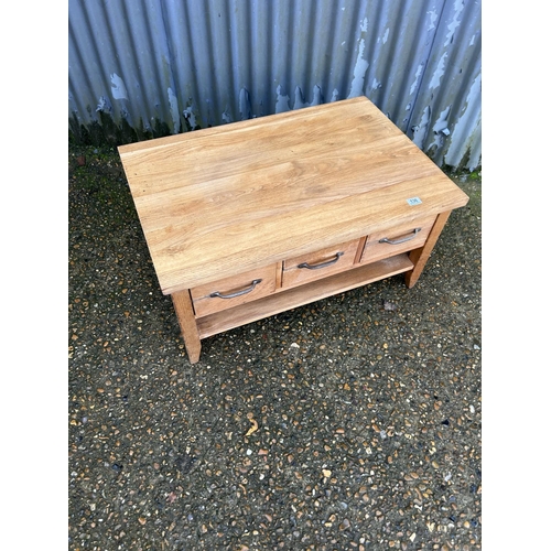 136 - A modern light oak three drawer coffee table 90x60x45