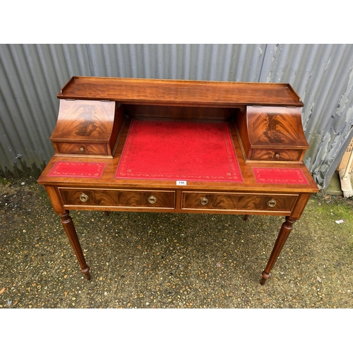 146 - A reproduction writing desk with red leather surface  106x60x100