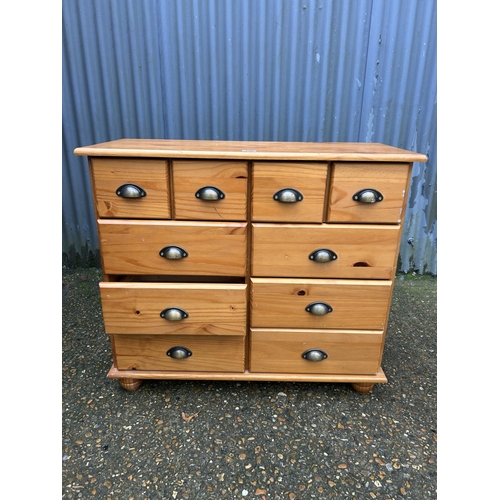 148 - A modern pine multi drawer chest 90x40x80