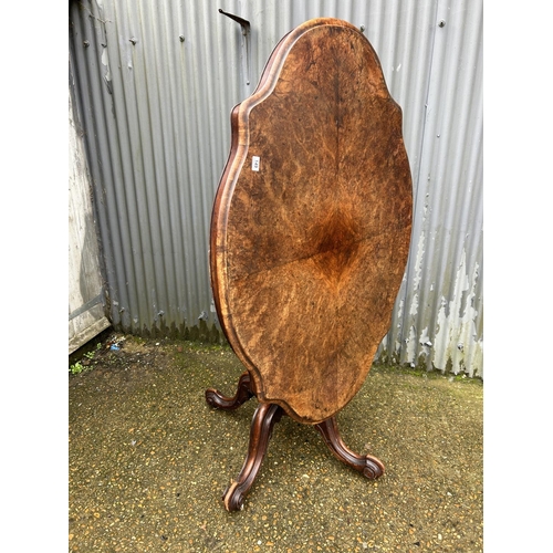 149 - A Victorian walnut tilt top centre table 150x105x85