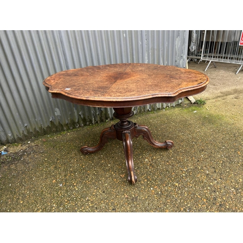 149 - A Victorian walnut tilt top centre table 150x105x85