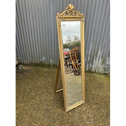 150 - A gold gilt cheval mirror