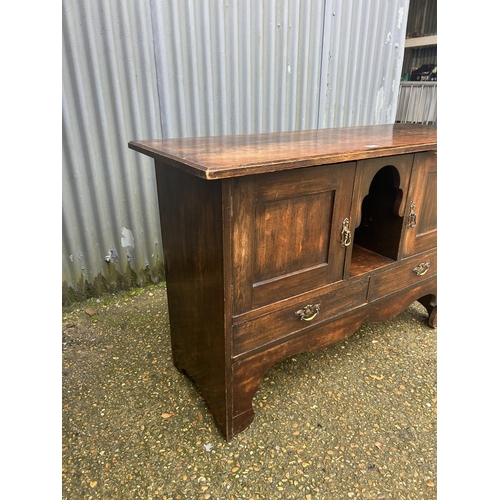 157 - An arts and crafts style oak sideboard 136x50x90