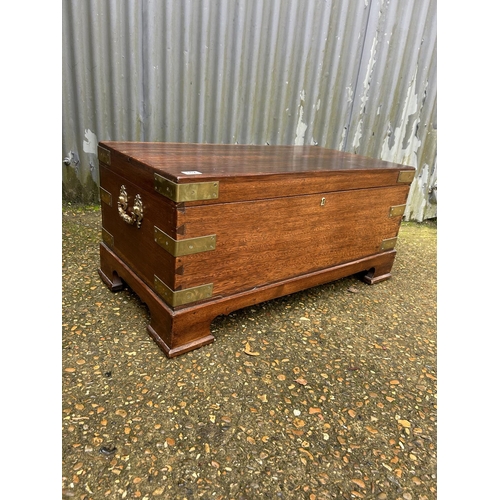 162 - A hardwood brass bound trunk with key 92x47x44