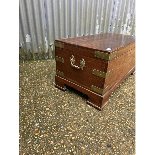 162 - A hardwood brass bound trunk with key 92x47x44