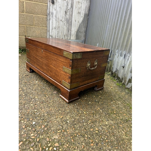 162 - A hardwood brass bound trunk with key 92x47x44